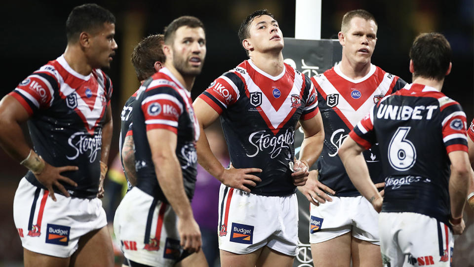 Roosters players looking tired.