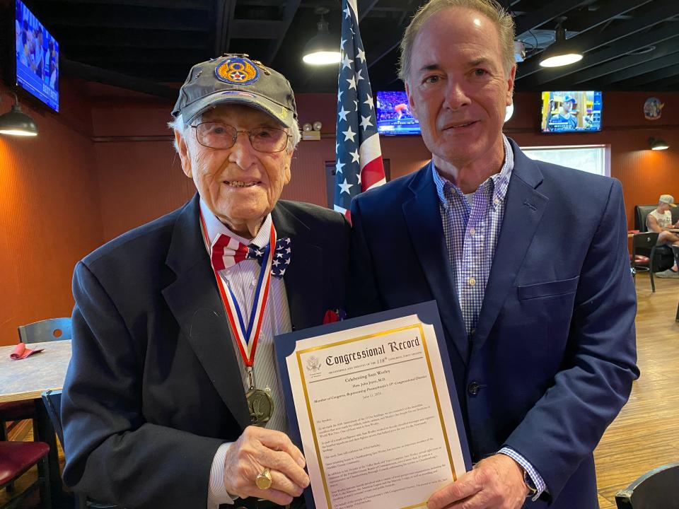 Sam Worley of Chambersburg received a copy of the Congressional Record from U.S. Rep. John Joyce, who recognized the Franklin County native, World War II veteran and community, business and government leader on the House floor in honor of his 103rd birthday. The presentation was made during the congressman’s visit to Greencastle on June 20.