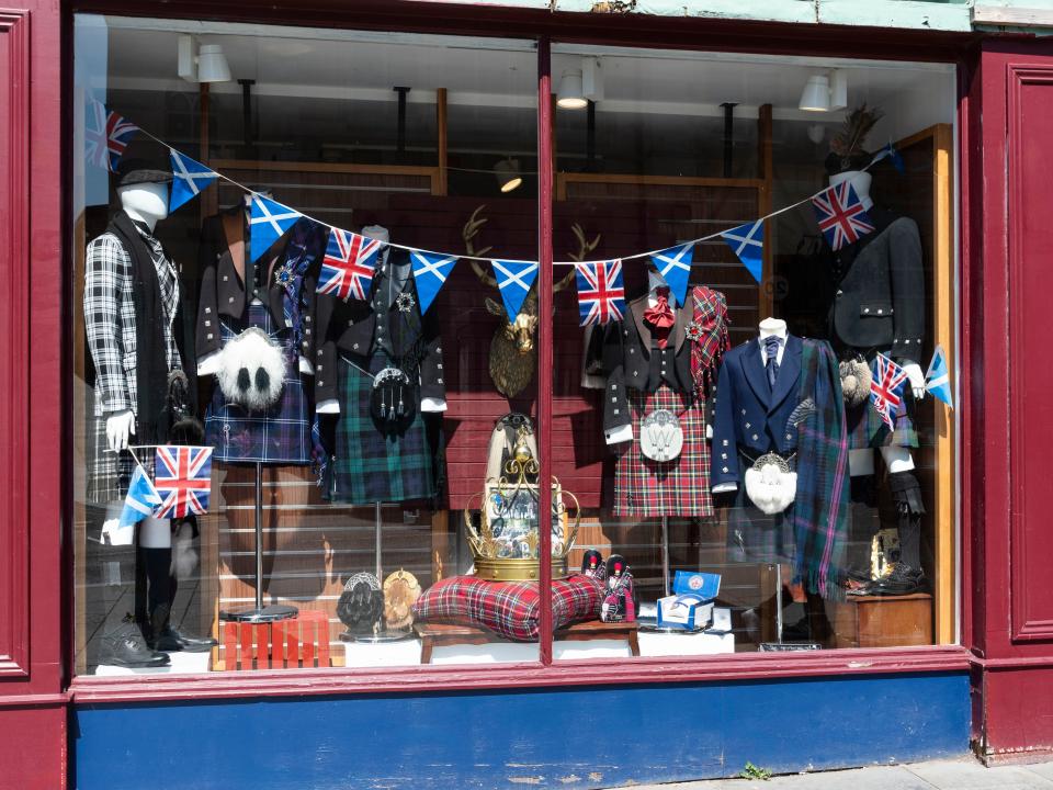 High Street Inverness shop selling Highland clothing being displayed in the shop window.