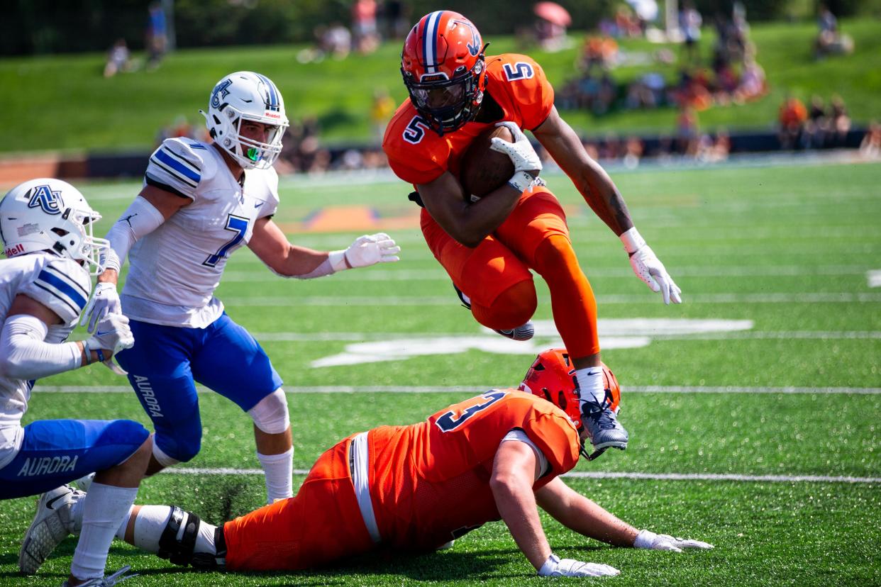 Hope's TJ McKenzie hurdles a lineman on his way to the redzone  Saturday, Sept. 3, 2022, at Ray and Sue Smith Stadium. 