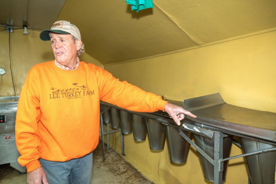 Ronny Lee, owner of Lee Turkey Farm in East Windsor, shows the processing room where turkeys are processed for Thanksgiving tables.