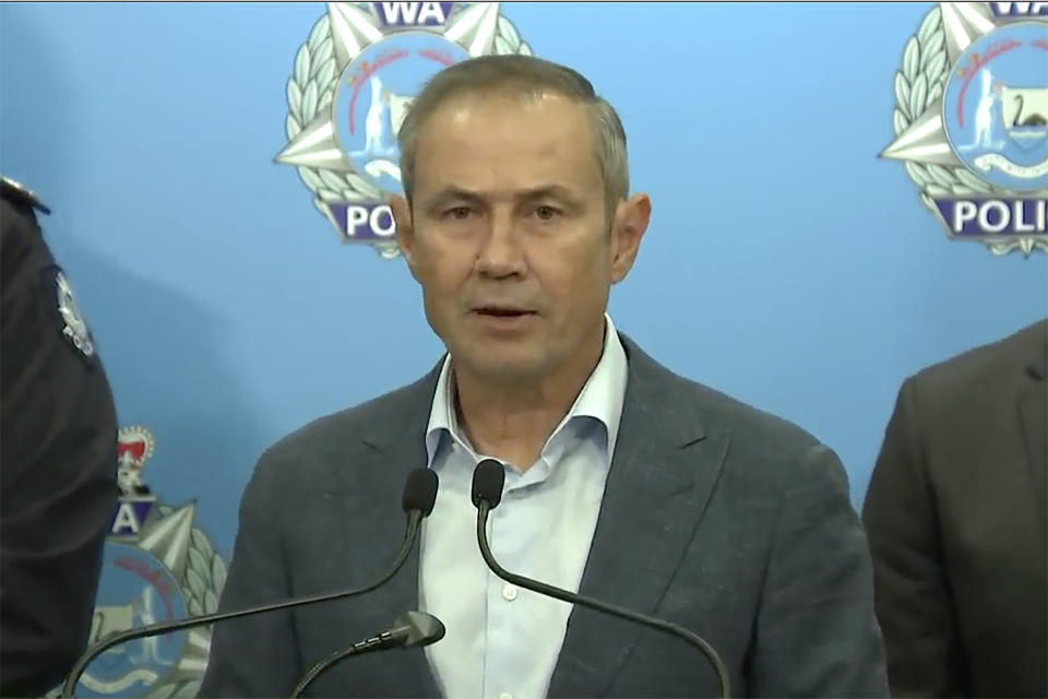 In this image from a video, Western Australian Premier Roger Cook speaks at a press conference in Perth, Australia Sunday, May 5, 2024. A 16-year-old boy armed with a knife was shot dead by police after he stabbed a man in the Australian west coast city of Perth, officials said Sunday. (Australian Broadcasting Corporation via AP)