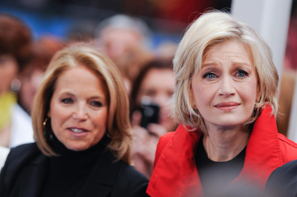 News reporters Katie Couric (L) and Diane Sawyer tape an interview at "Good Morning America" at the ABC Times Square Studios on October 3, 2011