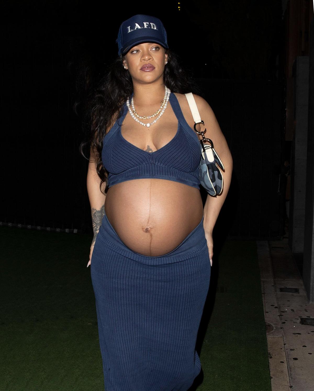 Pregnant Rihanna bares baby bump in new Louis Vuitton campaign