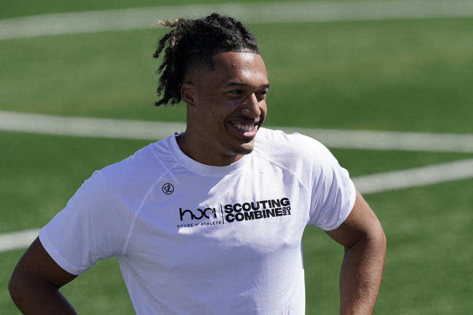 FILE - In this March 5, 2021, file photo, Texas A&M quarterback Kellen Mond watches the competition at a mini combine organized by House of Athlete in Fort Lauderdale, Fla. The Minnesota Vikings have drafted Mond, with their first of four third-round picks in the NFL football draft. (AP Photo/Marta Lavandier, File)