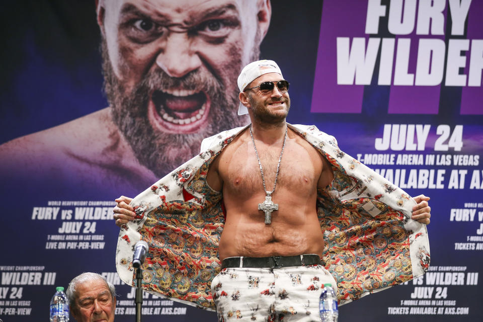 LOS ANGELES, CALIFORNIA - JUNE 15: Tyson Fury interacts with the crowd during the press conference with Deontay Wilder at The Novo by Microsoft at L.A. Live on June 15, 2021 in Los Angeles, California. (Photo by Meg Oliphant/Getty Images)