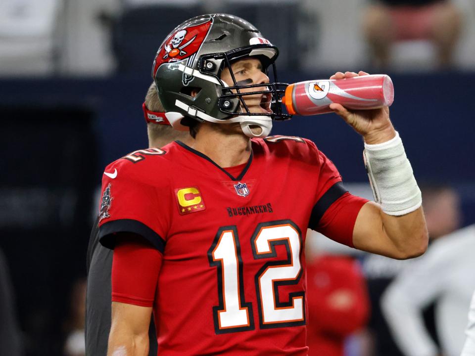 Tom Brady takes a drink during a game against the Dallas Cowboys.