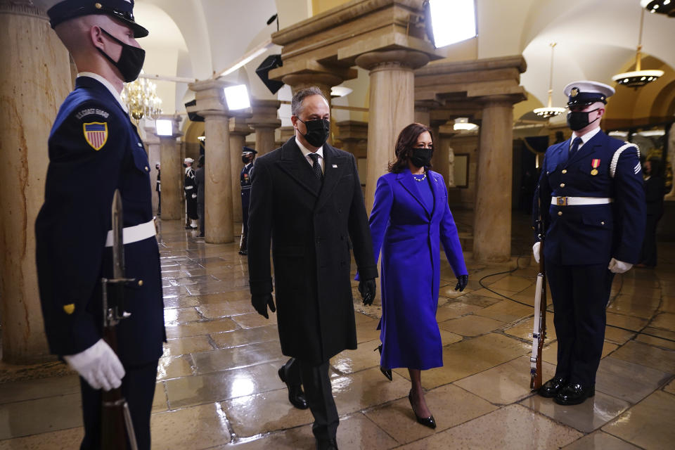 Vice President-elect Kamala Harris and Doug Emhoff arrive in the Crypt of the US Capitol for President-elect Joe Biden's inauguration ceremony on Wednesday, Jan. 20, 2021 in Washington. (Jim Lo Scalzo (Jim Lo Scalzo/Pool Photo via AP)