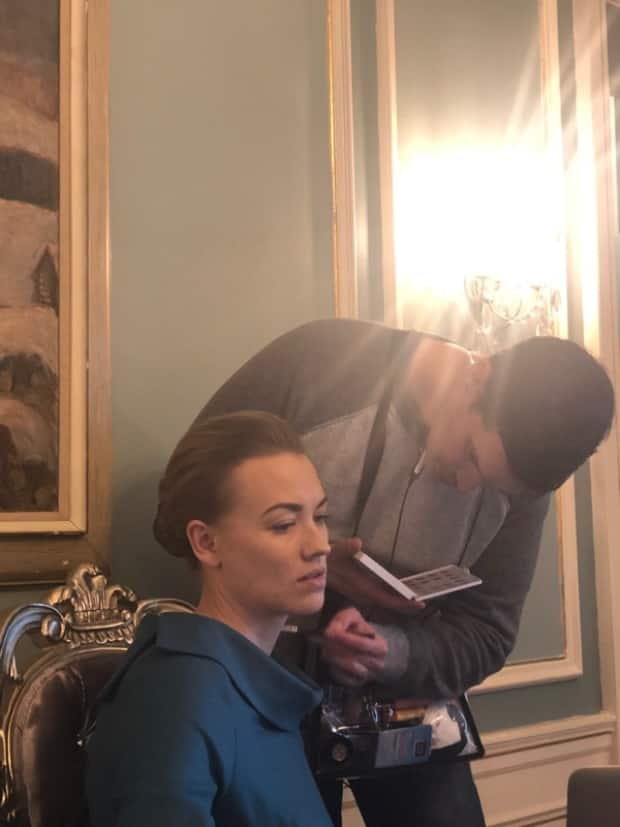 Alastair Muir (R) does makeup for Yvonne Strahovski, who plays Serena Joy Waterford on The Handmaid's Tale.   (Submitted by Alastair Muir. - image credit)