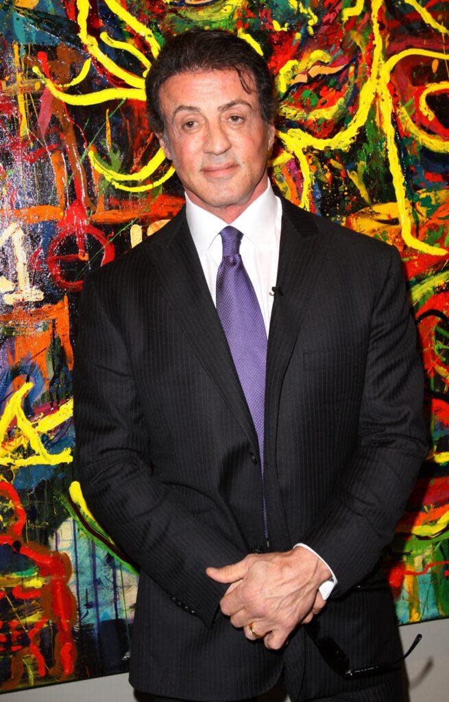 Sylvester Stallone and his wife Jennifer Flavin attend Art Basel Miami Beach where his artwork is on display