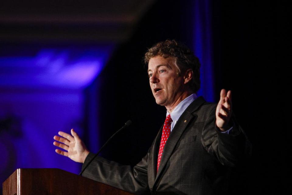 Kentucky Senator Rand Paul address attendees during the Republican National Committee spring meeting at the Peabody hotel in Memphis, Tenn., on Friday, May 9, 2014. Paul urged members to rethink policies on national security and drug prosecutions (AP Photo/The Commercial Appeal, William DeShazer)