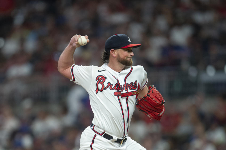 Atlanta Braves relief pitcher Kirby Yates throws in the seventh inning of a baseball game against the Houston Astros Saturday, Aug. 20, 2022, in Atlanta. (AP Photo/Hakim Wright Sr.)