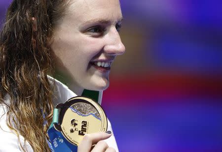 Swimming - 17th FINA World Aquatics Championships - Women's 200m IM final - Budapest, Hungary - July 24, 2017 - Katinka Hosszu of Hungary (gold) poses with the medal. REUTERS/Bernadett Szabo