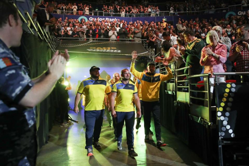 Athletes enter the arena.