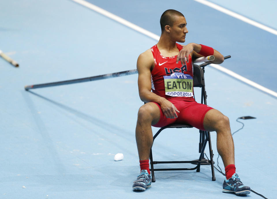 United States' Ashton Eaton rests on a chair in the heptathlon during the Athletics World Indoor Championships in Sopot, Poland, Saturday, March 8, 2014. (AP Photo/Petr David Josek)