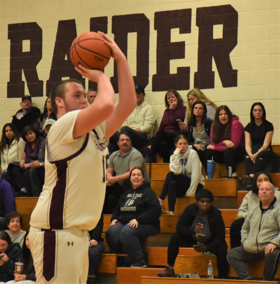 Canastota senior Caiden Bonneau attempts a three-point shot during the fourth quarter of Monday's Section III playoff game against Hannibal. Bonneau scored a game-high 24 points in a season-ending 65-56 loss at home.