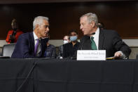 U.S. Ambassador to Japan nominee Rahm Emanuel, left, speaks with Senate Majority Whip Richard Durbin of Ill., after Durbin spoke in support of Emanuel's nomination before the Senate Foreign Relations Committee on Capitol Hill in Washington, Wednesday, Oct. 20, 2021. (AP Photo/Patrick Semansky)