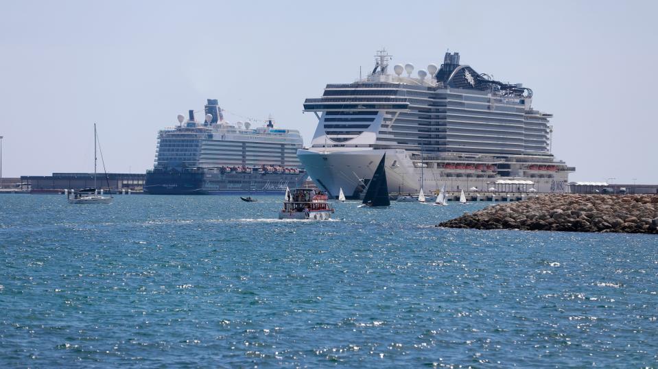 Two large boats along the coast of Palma, Spain.