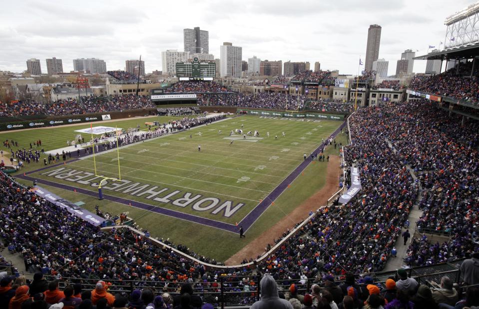 Illinois play against Northwestern during the first quarter of an NCAA college football game at Wrigley Field, home of the Chicago Cubs basebal team, in Chicago on Saturday, Nov. 20, 2010. (AP Photo/Nam Y. Huh)