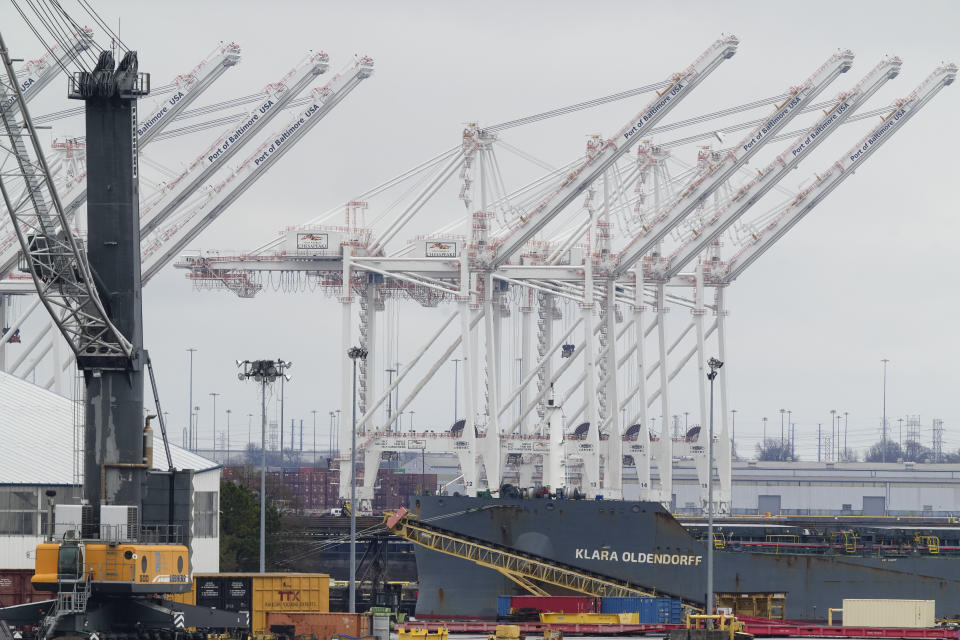 Cranes stand idle on Wednesday, March 27, 2024, in Baltimore, Md. A container ship rammed into the Francis Scott Key Bridge in Baltimore early Tuesday, causing it to collapse in a matter of seconds and creating a terrifying scene as several vehicles plunged into the chilly river below. (AP Photo/Matt Rourke)