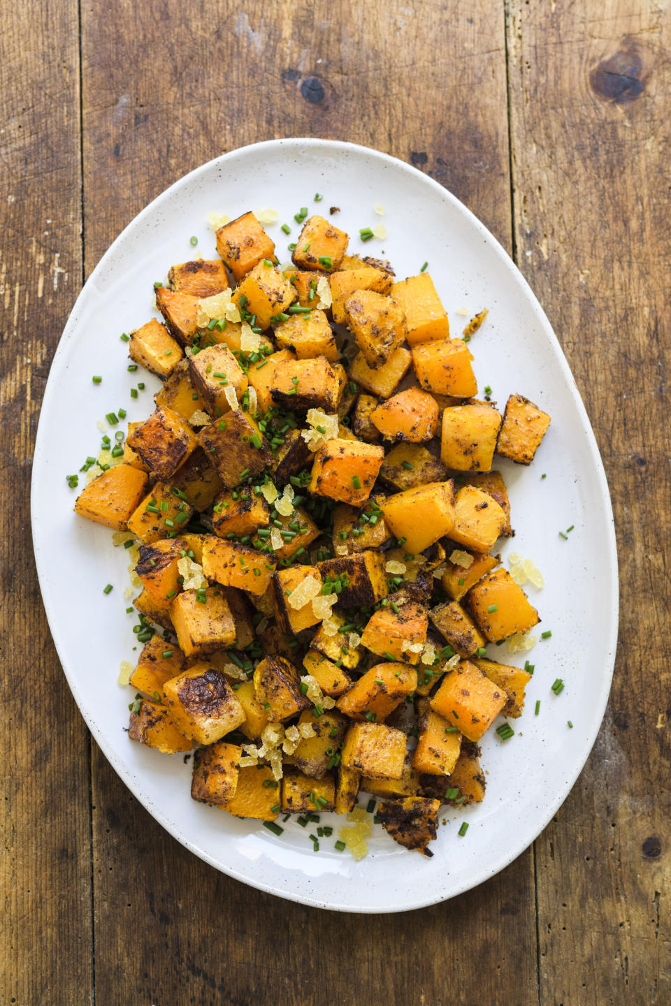 This image released by Milk Street shows a recipe for roasted butternut squash with ginger and five-spice. (Milk Street via AP)