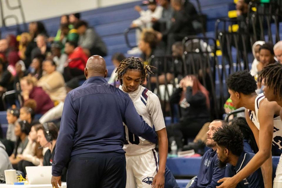 Dwyer's Anthony Gatlin walks to the sideline against Lake Worth on Jan. 30, 2024.