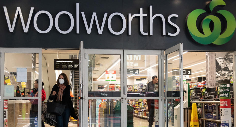 Photo shows the front of a Woolworths store. 