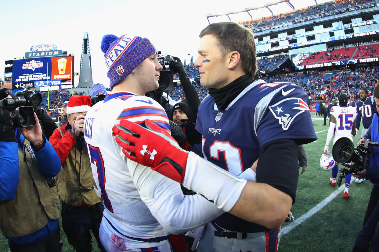 FOXBOROUGH, MA - DECEMBER 23:  Josh Allen #17 of the Buffalo Bills and Tom Brady #12 of the New England Patriots meet on the field after the New England Patriots defeated the Buffalo Bills 24-12 at Gillette Stadium on December 23, 2018 in Foxborough, Massachusetts.  (Photo by Maddie Meyer/Getty Images)