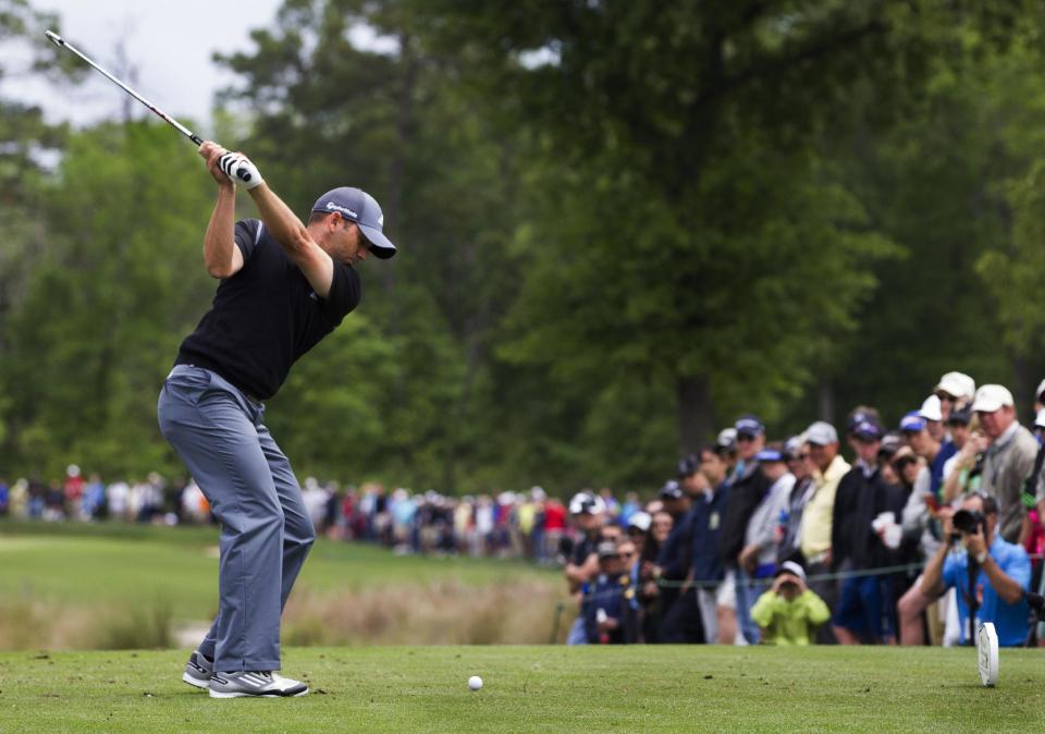 Sergio Garcia hits off the tee on the ninth hole during the third round of the Houston Open golf tournament on Saturday, April 5, 2014, in Humble, Texas. (AP Photo/Patric Schneider)