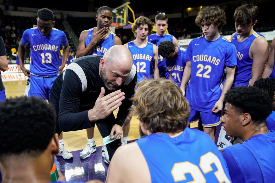 Goodpasture head coach Adam Sonn works with his team against Clarksville Academy during the second quarter of a DII-A semifinal game at the Hooper Eblen Center in Cookeville, Tenn., Thursday, March 2, 2023.