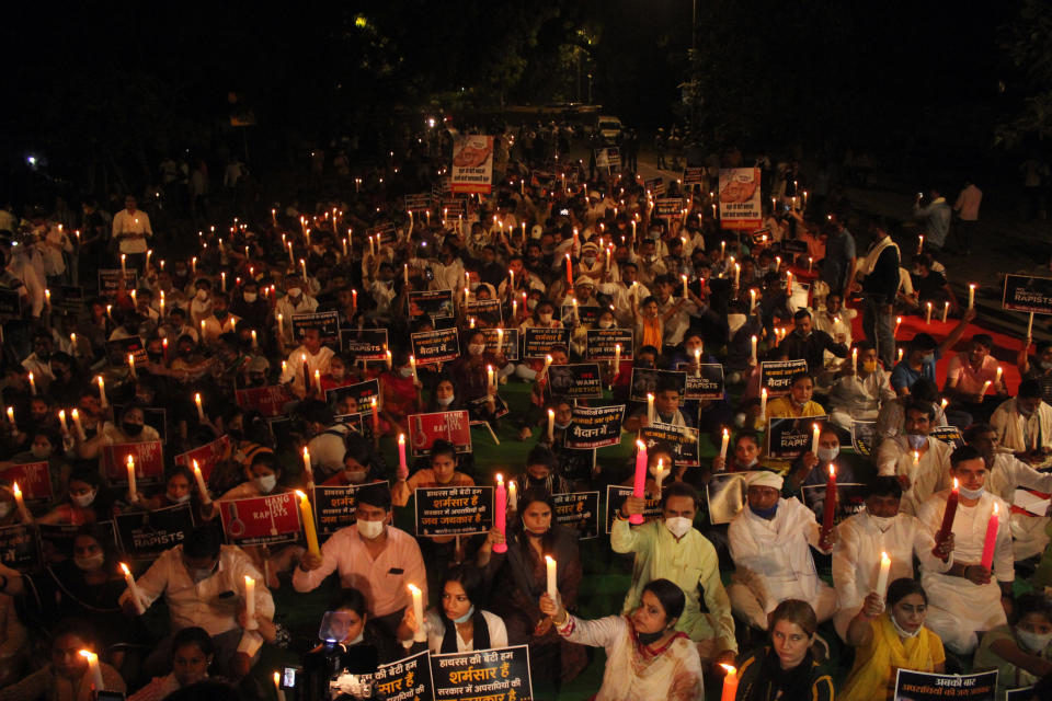 Activists of the Indian Youth Congress took out a candle light march at Jantar Mantar demanding justice for the Hathras gang-rape victim, who died at a government hospital in Delhi last month, on October 12, 2020 in New Delhi, India. The candle light march was also joined by Rajya Sabha MP Shaktisinh Gohil. (Photo by Mayank Makhija/NurPhoto via Getty Images)