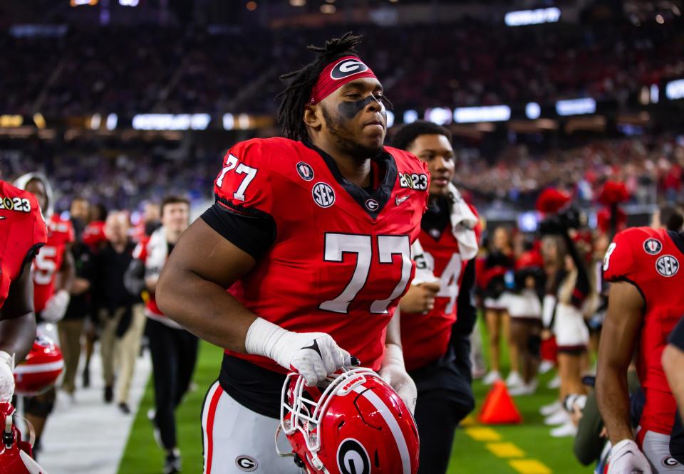 Jan 9, 2023; Inglewood, CA, USA; Georgia Bulldogs offensive lineman Devin Willock (77),  here against the TCU Horned Frogs during the CFP national championship game at SoFi Stadium. Mandatory Credit: Mark J. Rebilas-USA TODAY Sports