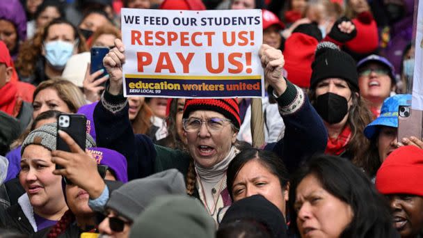 PHOTO: Los Angeles public school support staff and teachers, rally outside of the school district headquarters on the first day of a three day strike, Mar. 21, 2023, in Los Angeles. (Robyn Beck/AFP via Getty Images)