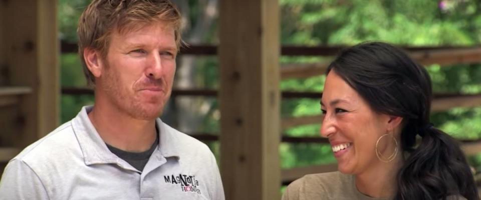 Joanna Gaines laughs at her husband Chip.