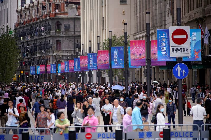 People visit a main shopping area following the coronavirus disease (COVID-19) outbreak in Shanghai