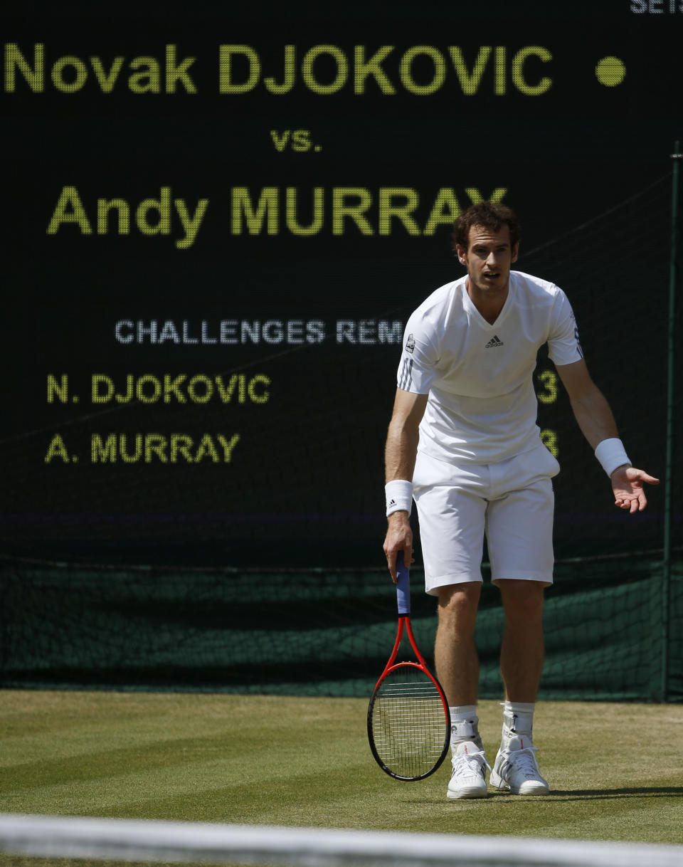 Great Britain's Andy Murray reacts in his Men's Final against Serbia's Novak Djokovic during day thirteen of the Wimbledon Championships at The All England Lawn Tennis and Croquet Club, Wimbledon.