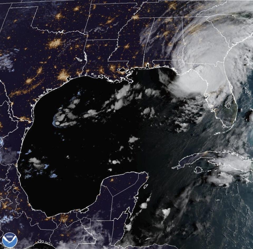 This image provided by NOAA shows shows Hurricane Idalia over Florida's Gulf Coast on Wednesday, Aug. 30, 2023. (NOAA via AP)