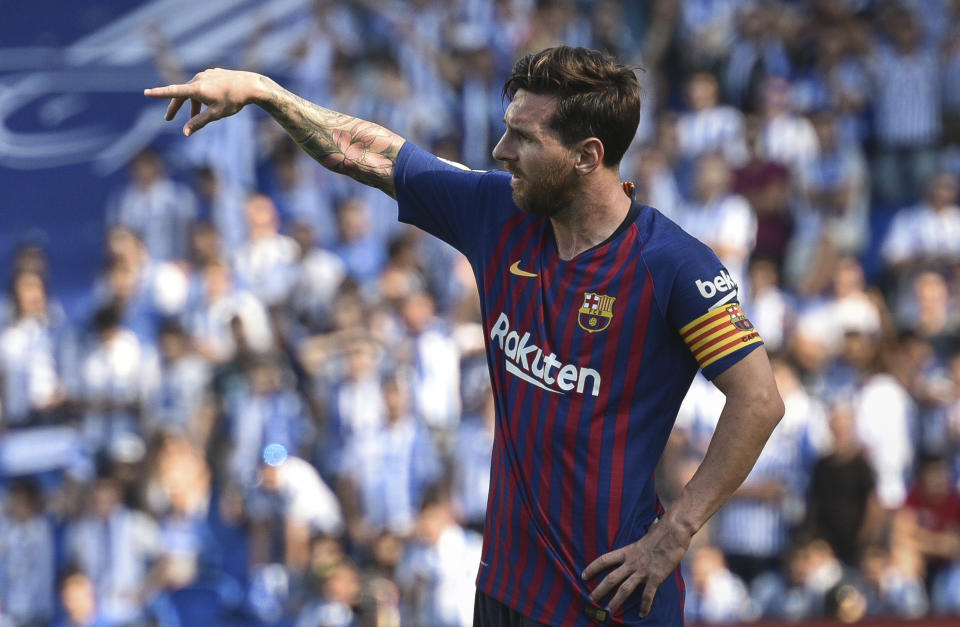 FC Barcelona's Lionel Messi gestures during the Spanish La Liga soccer match between Real Sociedad and FC Barcelona at the Anoeta stadium, in San Sebastian, northern Spain, Saturday, Sept. 15, 2018. (AP Photo/Jose Ignacio Unanue)