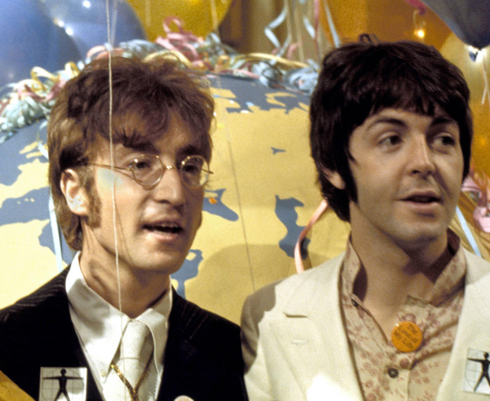 Paul McCartney and John Lennon at a press call for Our World broadcast. (Cummings Archives / Redferns)