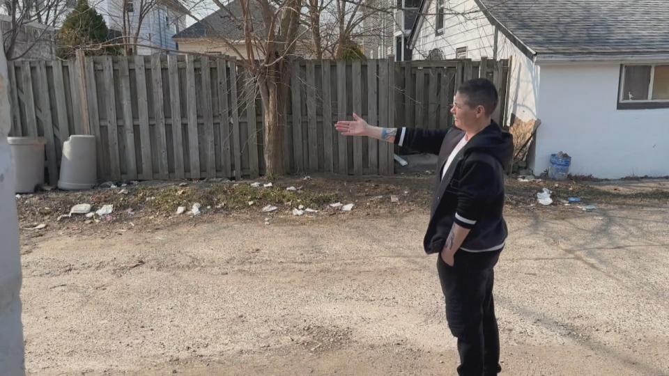 Trisha-Mae Tousignant said she's worried that switching to curb-side garbage pickup will result in people's front yards looking as trashy as the alley currently does.
