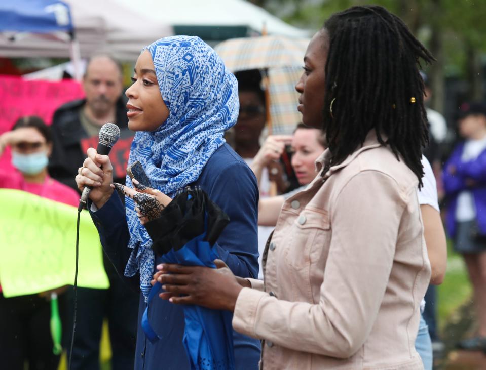 State Rep. Madinah Wilson-Anton, left, and state Sen. Marie Pinkney speak as more than 300 people protest for abortion rights at Wilmington's Tubman-Garrett Riverfront Park on Saturday afternoon, May 14, 2022.