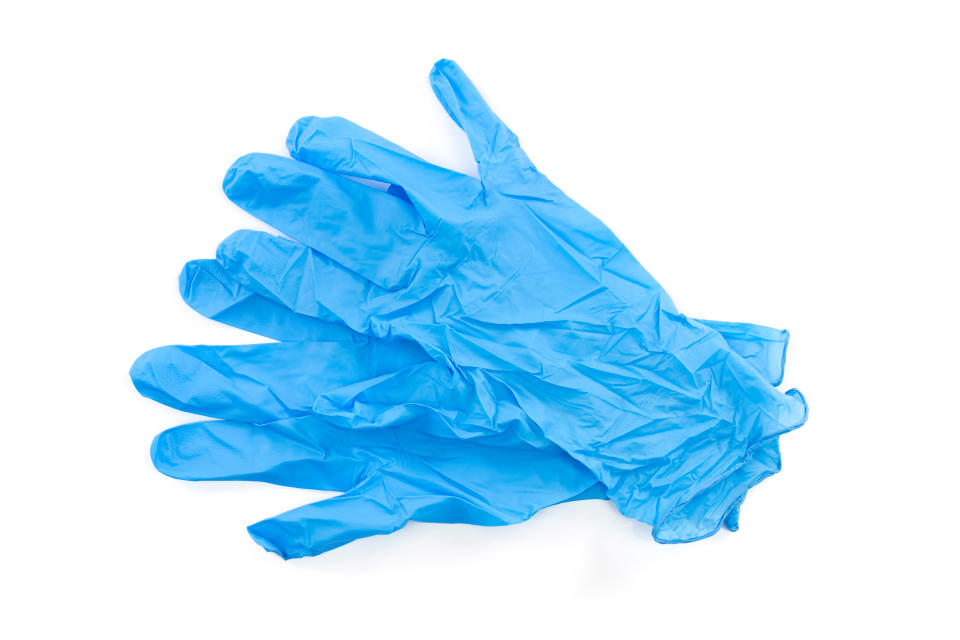 Blue latex medical and laboratory gloves isolated on white background coronavirus prevention