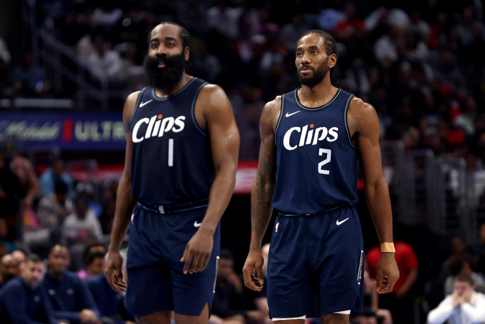 LOS ANGELES, CALIFORNIA - NOVEMBER 24: Kawhi Leonard #2 and James Harden #1 of the Los Angeles Clippers looks on in the third quarter against the New Orleans Pelicans during an NBA In-Season Tournament game at Crypto.com Arena on November 24, 2023 in Los Angeles, California. NOTE TO USER: User expressly acknowledges and agrees that, by downloading and or using this photograph, User is consenting to the terms and conditions of the Getty Images License Agreement.  (Photo by Katelyn Mulcahy/Getty Images)