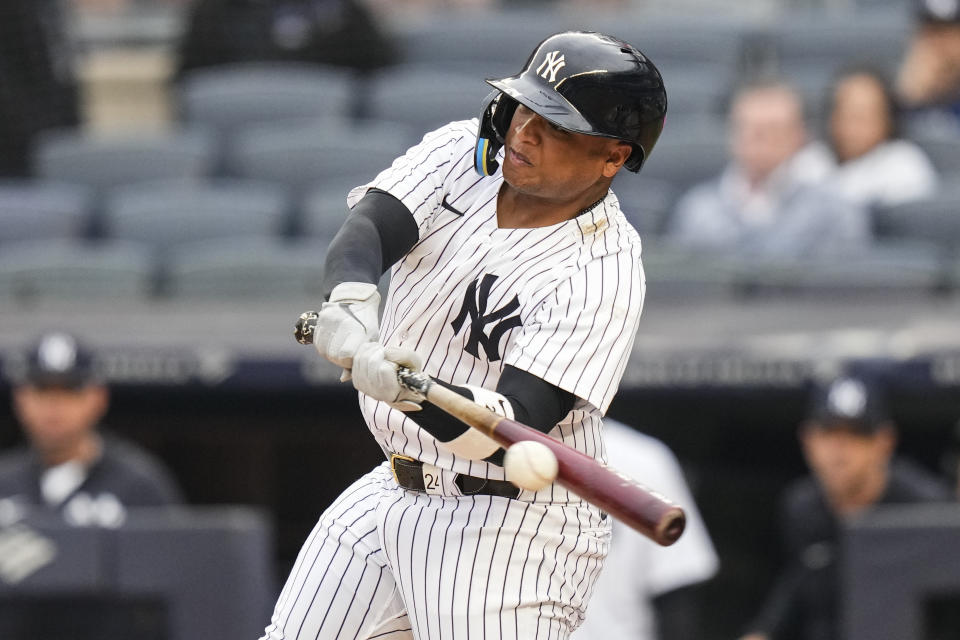 New York Yankees' Willie Calhoun hits an RBI-single during the second inning in the first baseball game of a doubleheader against the Chicago White Sox, Thursday, June 8, 2023, in New York. (AP Photo/Frank Franklin II)