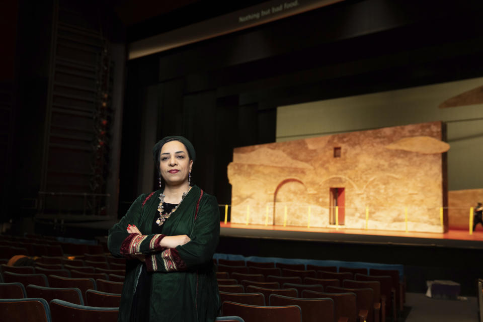 Roya Sadat, the stage director of the opera "A Thousand Splendid Suns," stands for a portrait in Seattle, on Wednesday, Feb. 22, 2023. In her director’s statement, she writes, “My task was no longer to simply portray the universal pain, struggle, and perseverance of women through the story of two Afghan women. It became a duty to convey an unparalleled injustice to which my countrywomen are condemned.” (AP Photo/Stephen Brashear)