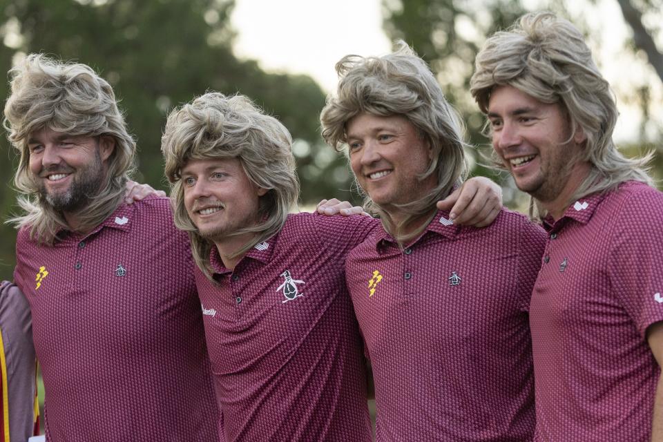 From left to right, Ripper GC's Marc Leishman, captain Cameron Smith, Matt Jones and Lucas Herbert pose for a photo while wearing wigs after the final round of LIV Golf Adelaide at Grange Golf Club, Sunday, April 28, 2024, in Adelaide, Australia. (Jon Ferrey/LIV Golf via AP)