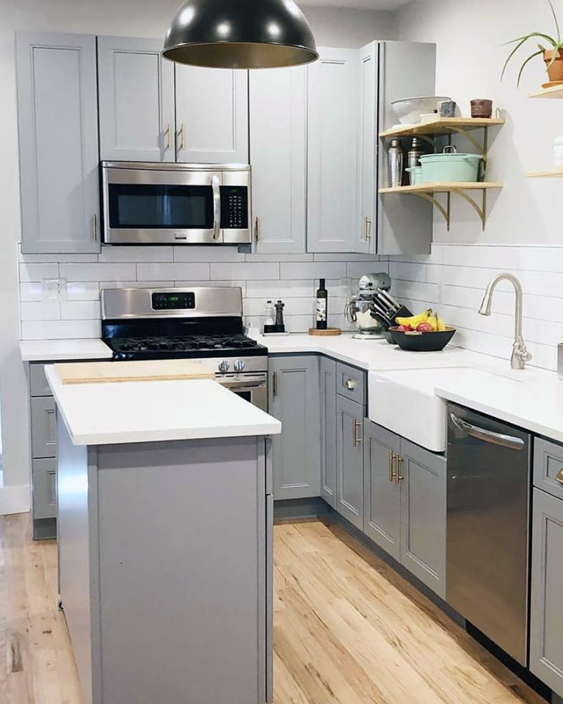 White kitchen with pale gray/blue cabinets