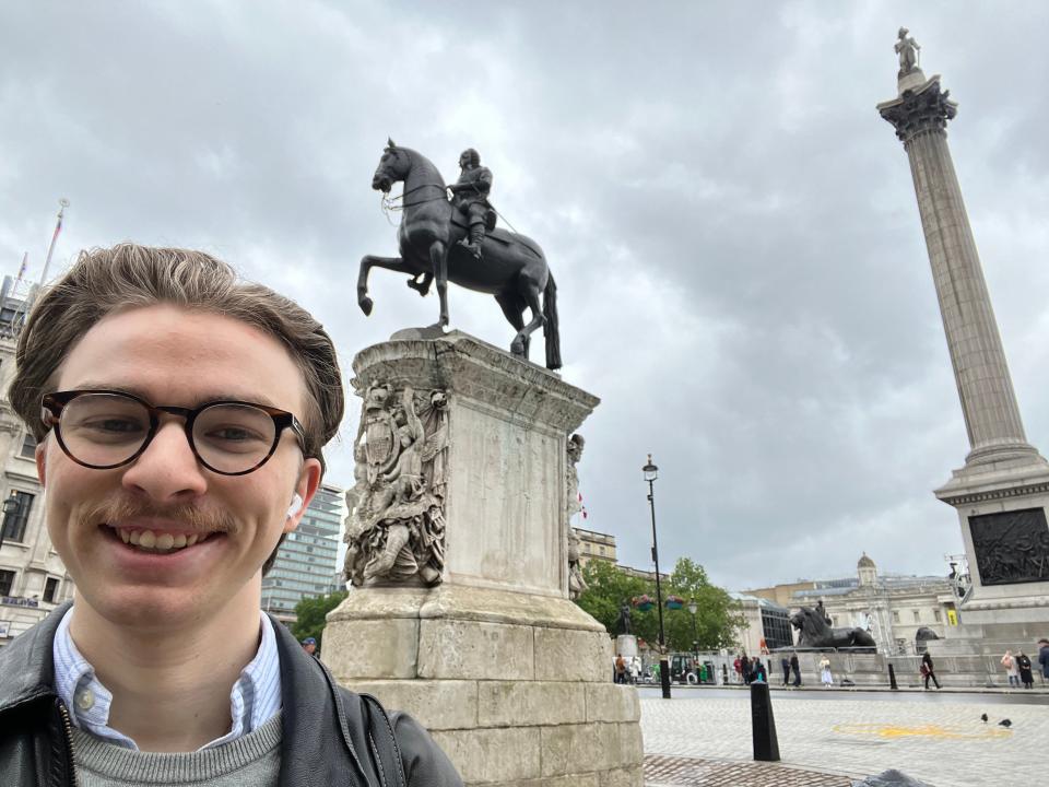 Business Insider's Pete Syme takes a selfie at London's Trafalgar Square where the center of the city is measured.