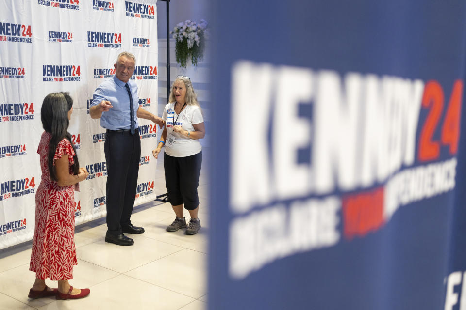 PHOENIX, ARIZONA - DECEMBER 20: Independent Presidential candidate Robert F. Kennedy Jr. takes pictures with supporters during his campaign rally at Legends Event Center on December 20, 2023 in Phoenix, Arizona. (Photo by Rebecca Noble/Getty Images)