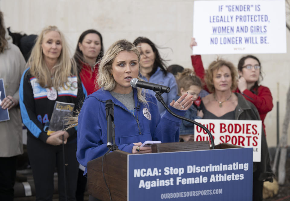 Former University of Kentucky swimmer Riley Gaines speaks at a rally on Thursday, Jan. 12, 2023, outside of the NCAA Convention in San Antonio. (AP Photo/Darren Abate)
